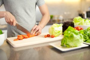 Man cooking in the kitchen at home