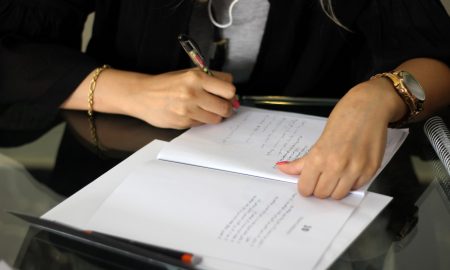 certified translation document in picture a women is translating a document